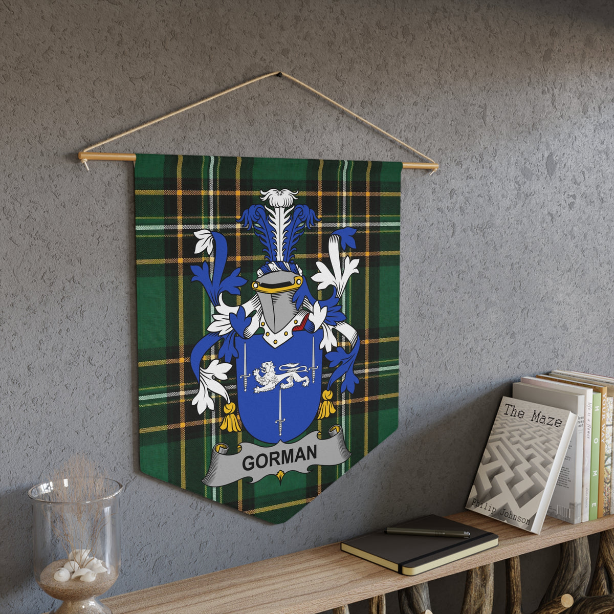 Gorman crest on a green tartan pennant banner.