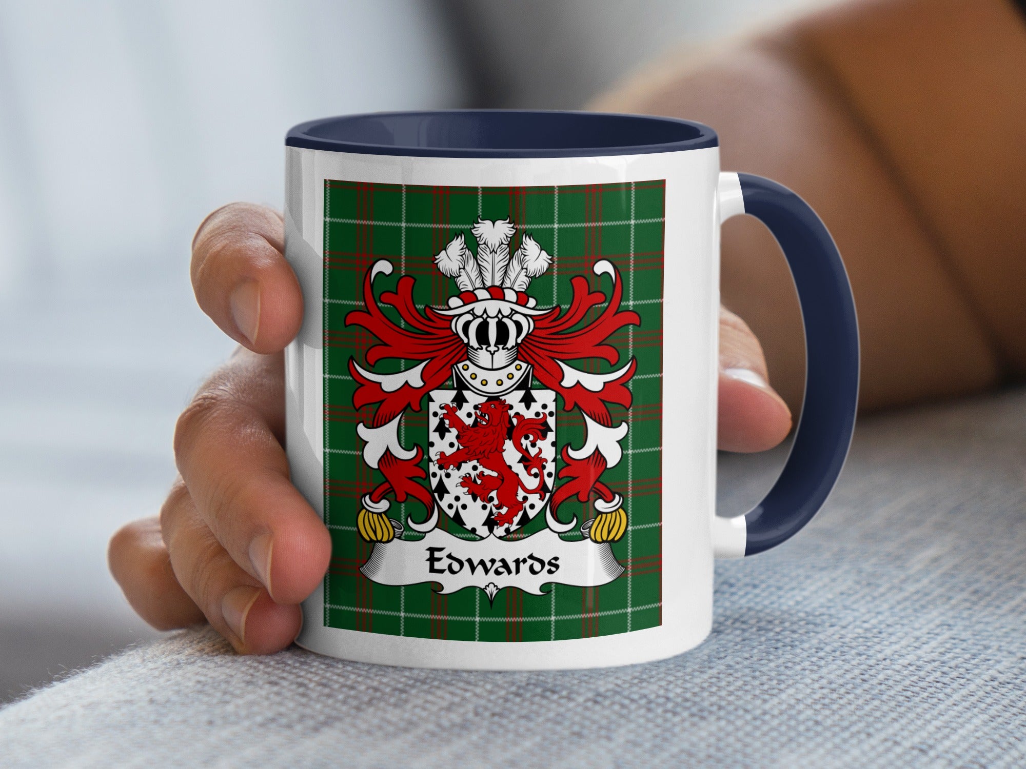 White mug with blue handle featuring the Edwards family crest on a green tartan background.