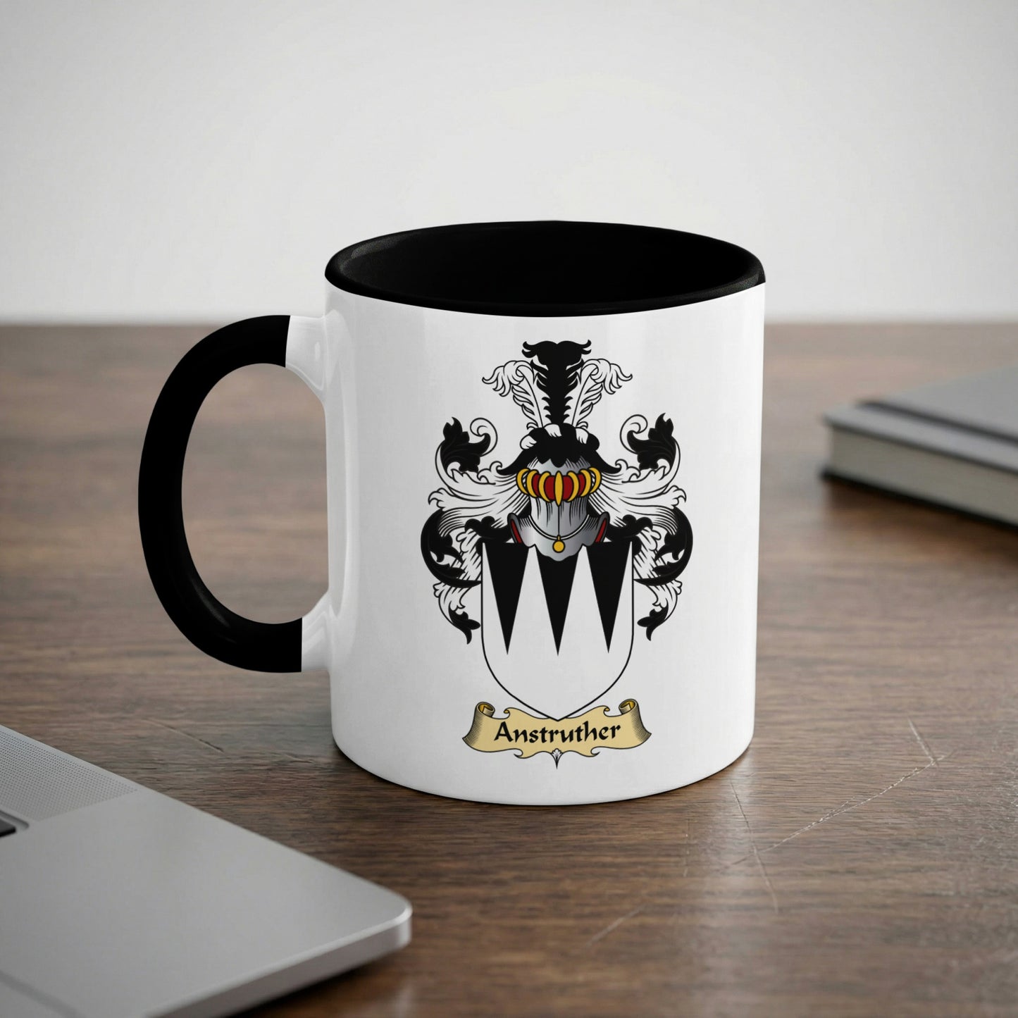 White mug with black rim and handle, displaying the Anstruther coat of arms.