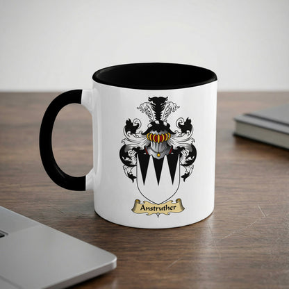 White mug with black rim and handle, displaying the Anstruther coat of arms.