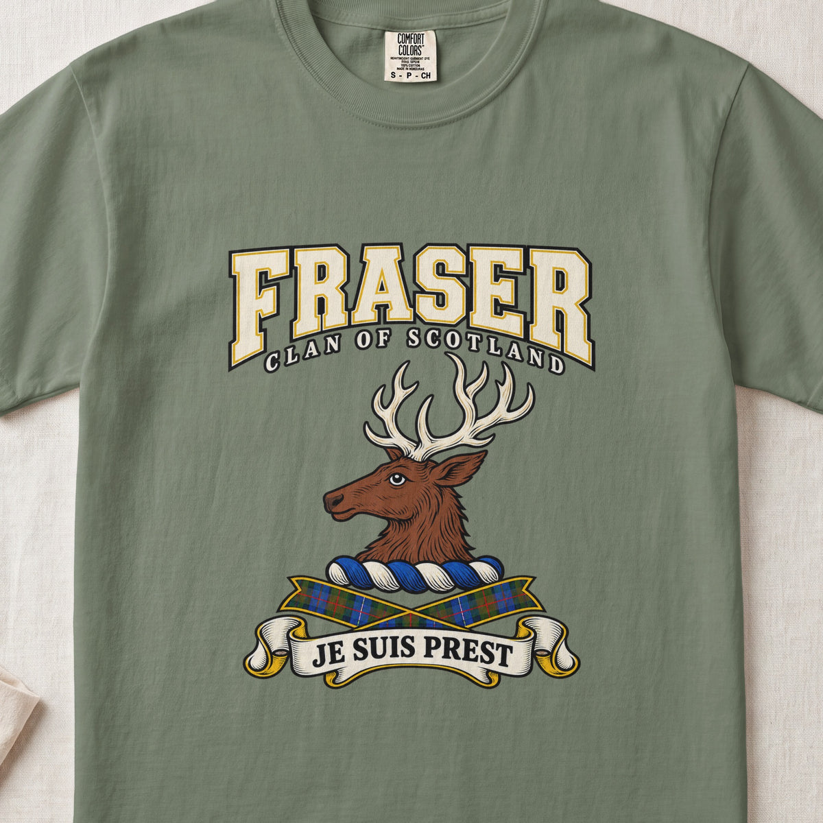 Fraser graphic T-shirt in Moss green, front flat lay showing varsity lettering and brown stag head with cream antlers.