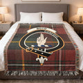 Boyd clan tartan woven blanket on sofa — 100% cotton with red-green plaid and clan crest