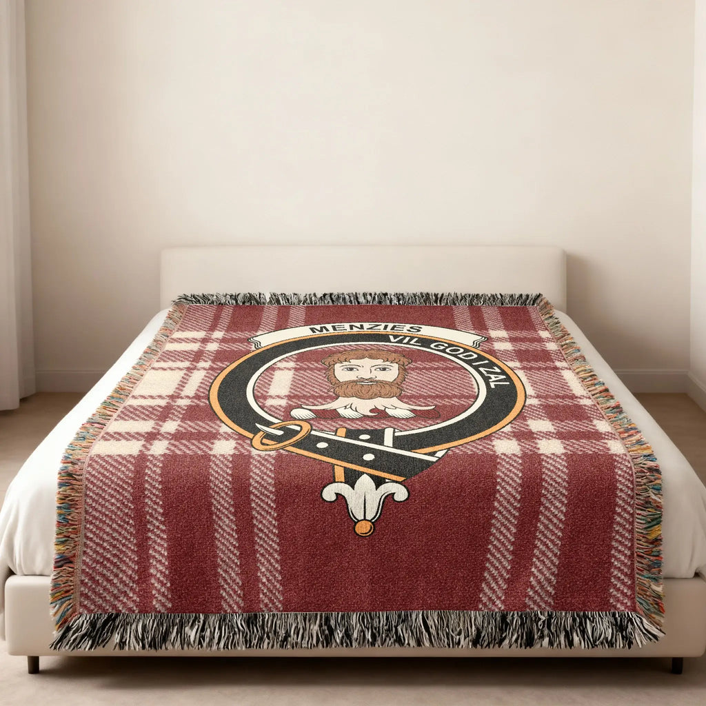 Menzies clan crest tartan woven blanket folded with fringe — red plaid pattern in 100% cotton