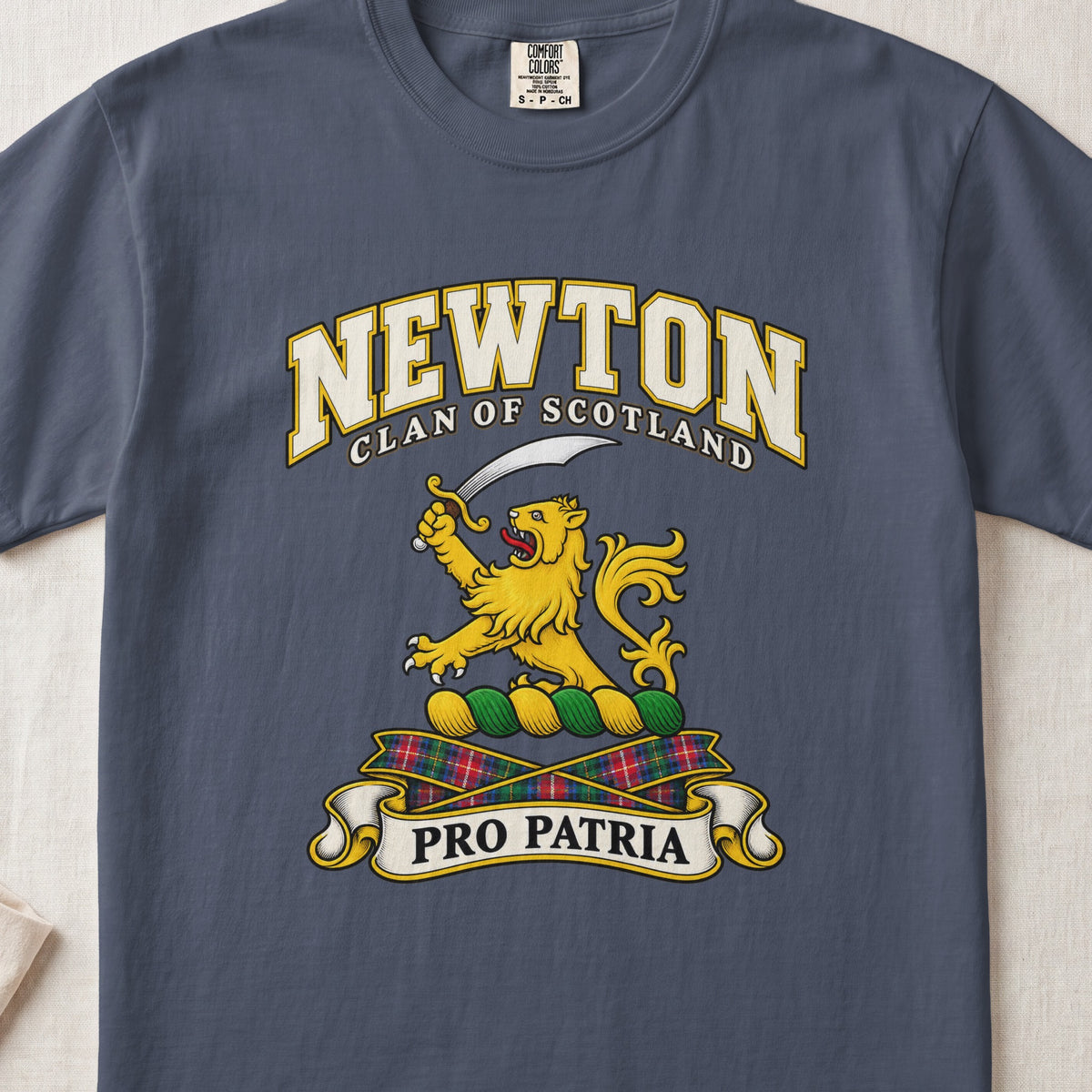 Newton Scottish clan T-shirt in Midnight, front view with a gold lion holding a curved sword and motto banner.