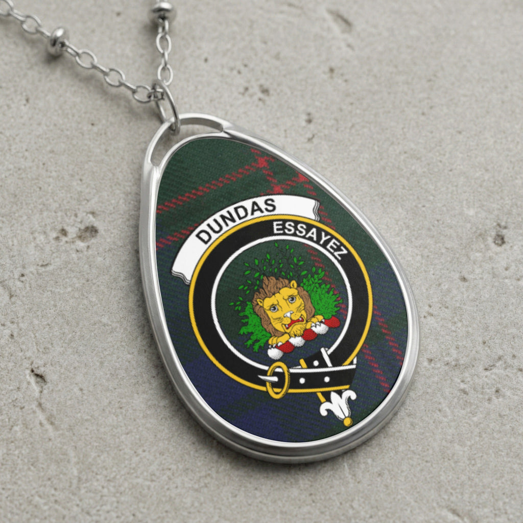 Dundas clan Scottish tartan necklace with clan crest and Essayez motto on tartan background