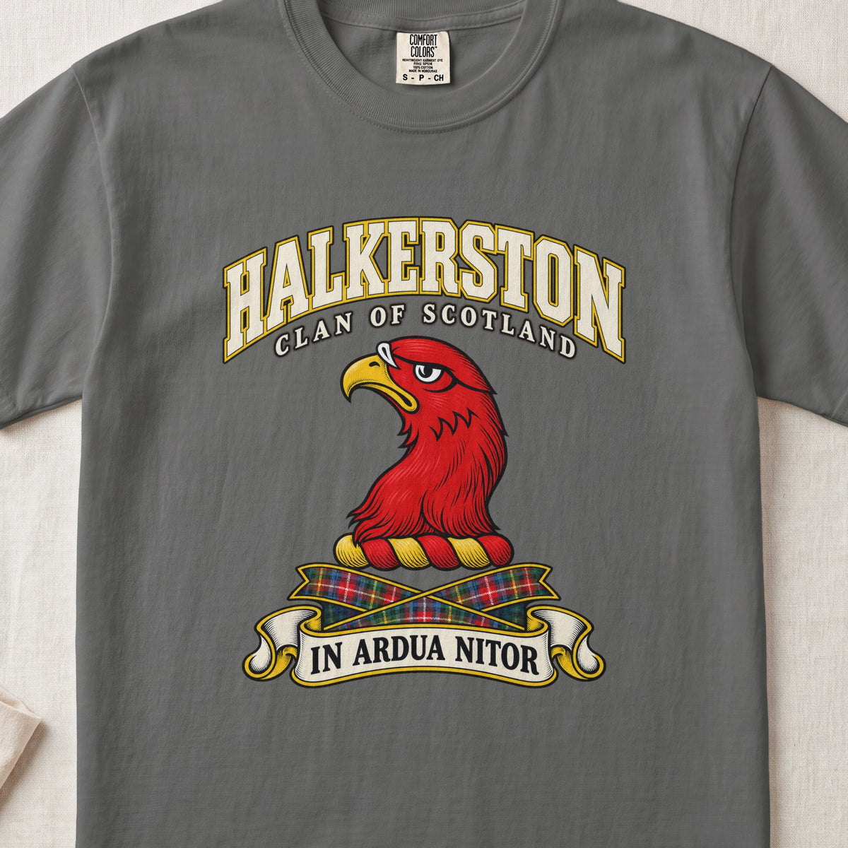 Halkerston Scottish clan T-shirt in Pepper, front view with a red bird head with a golden beak and motto banner.