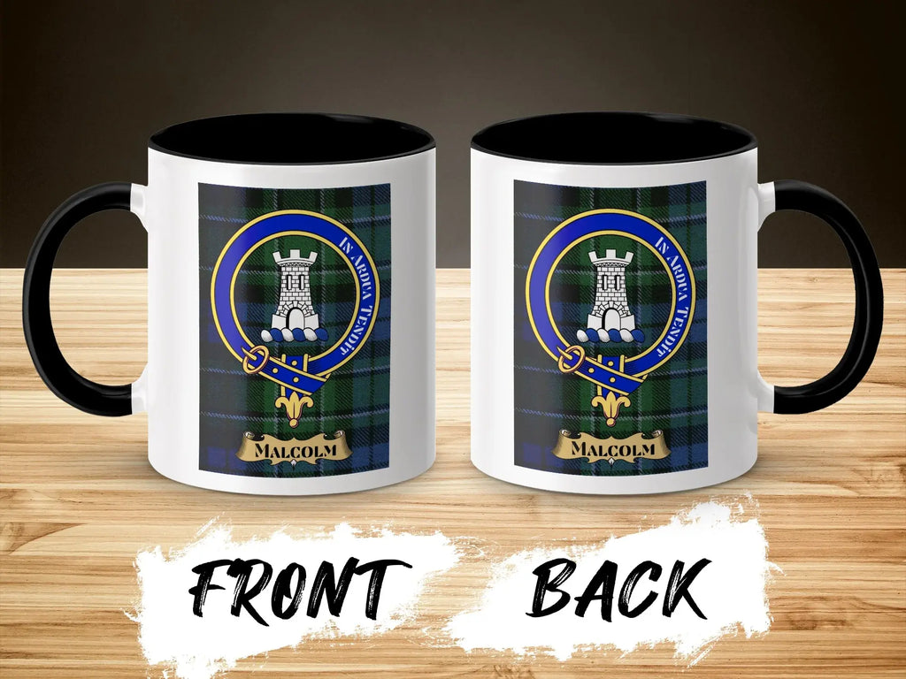 Malcolm clan crest mug shown front and back — tower above waves crest on glossy ceramic, wooden surface