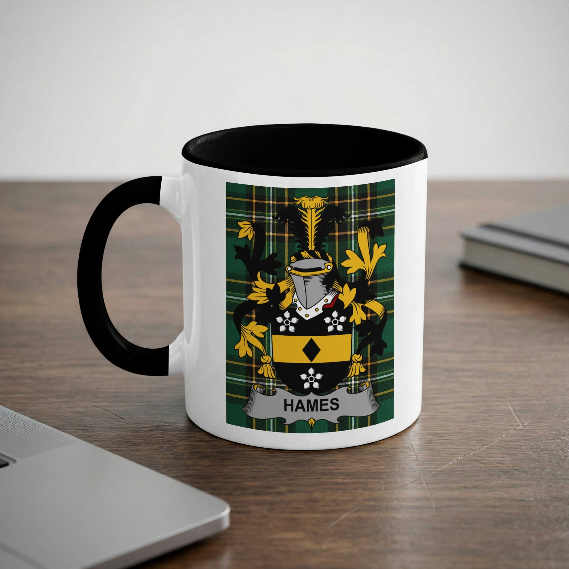 White mug with black rim featuring the Hames family crest on a checkered background.