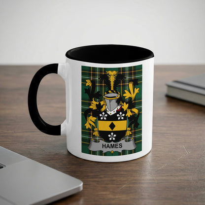 White mug with black rim featuring the Hames family crest on a checkered background.