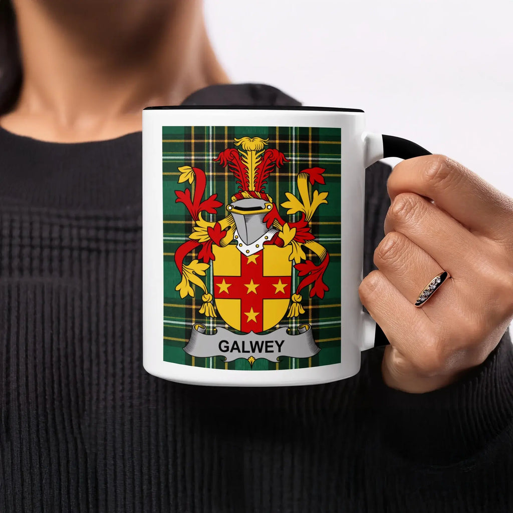 Black mug with "GALWEY" coat of arms on a plaid background.