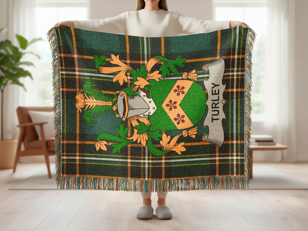 Green and orange plaid blanket with a coat of arms and "TURLEY" text.