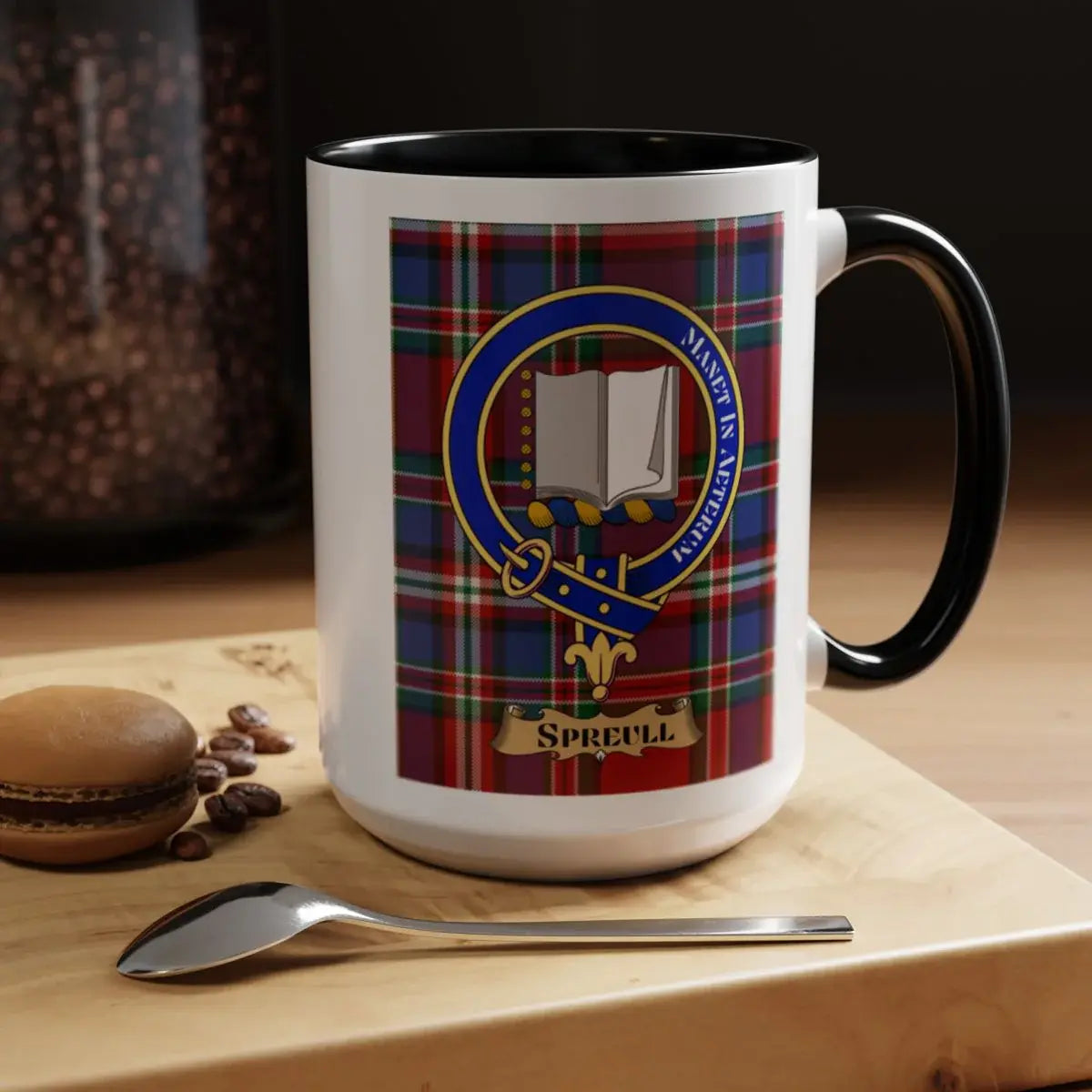 Close-up of the Spreull clan crest printed on a ceramic mug