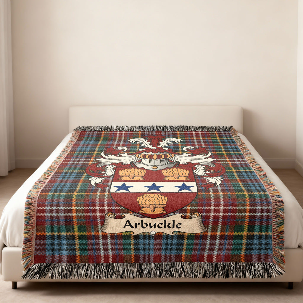 Arbuckle family crest emblem on a Caledonia tartan woven blanket