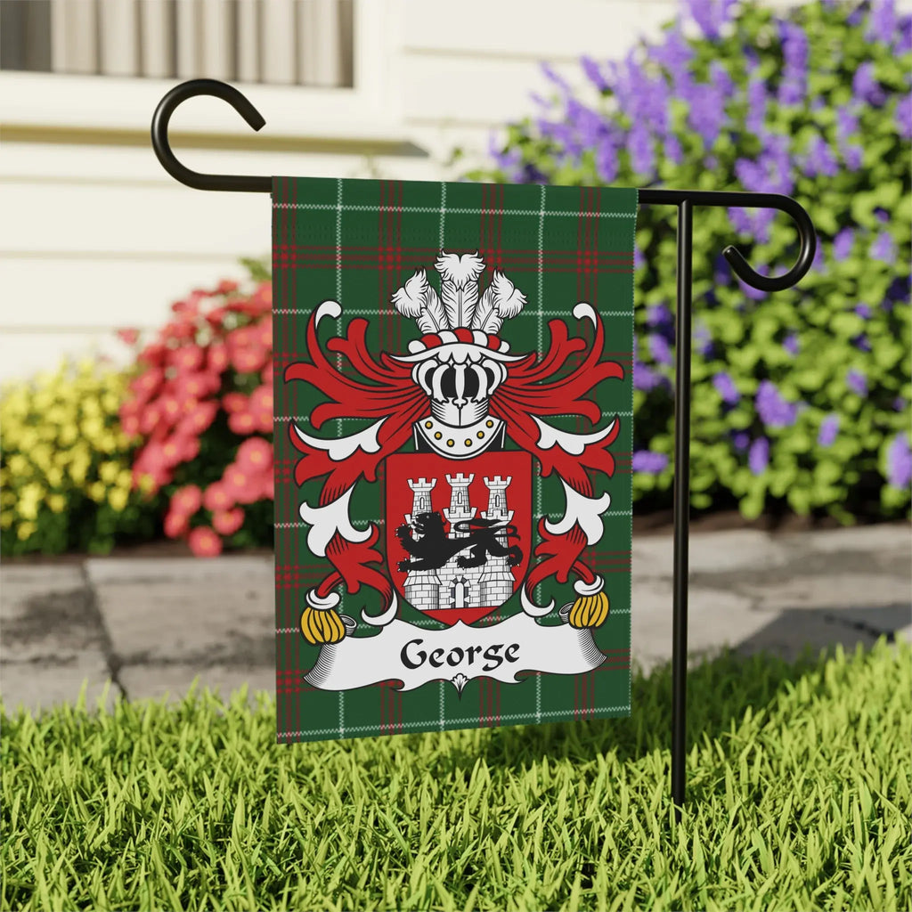 Green tartan flag with George family crest on a stand.