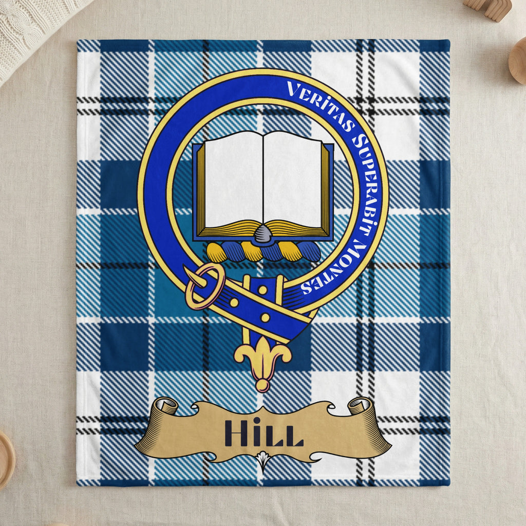 Hill clan blue tartan throw blanket with crest — draped display