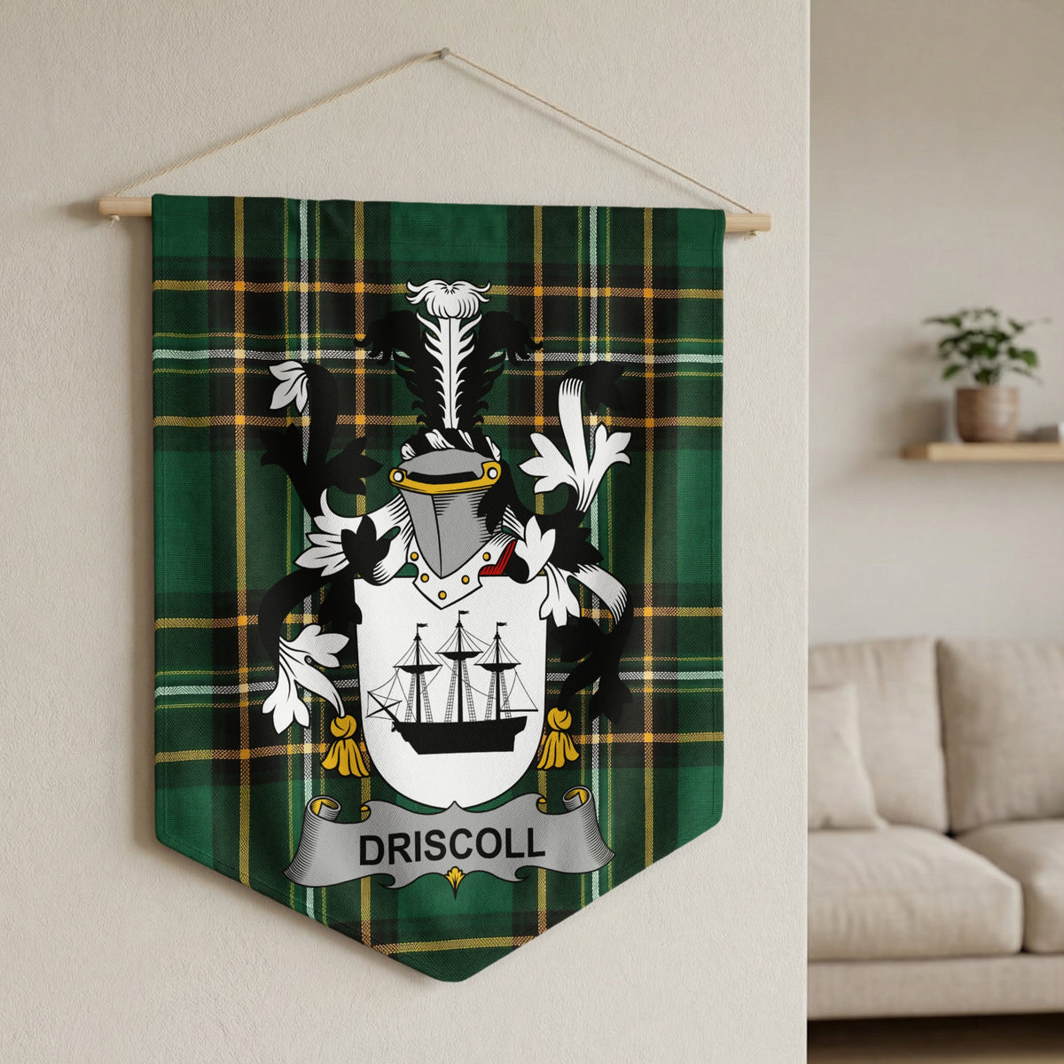 Driscoll family crest on a green tartan plaid banner hanging on a wall.