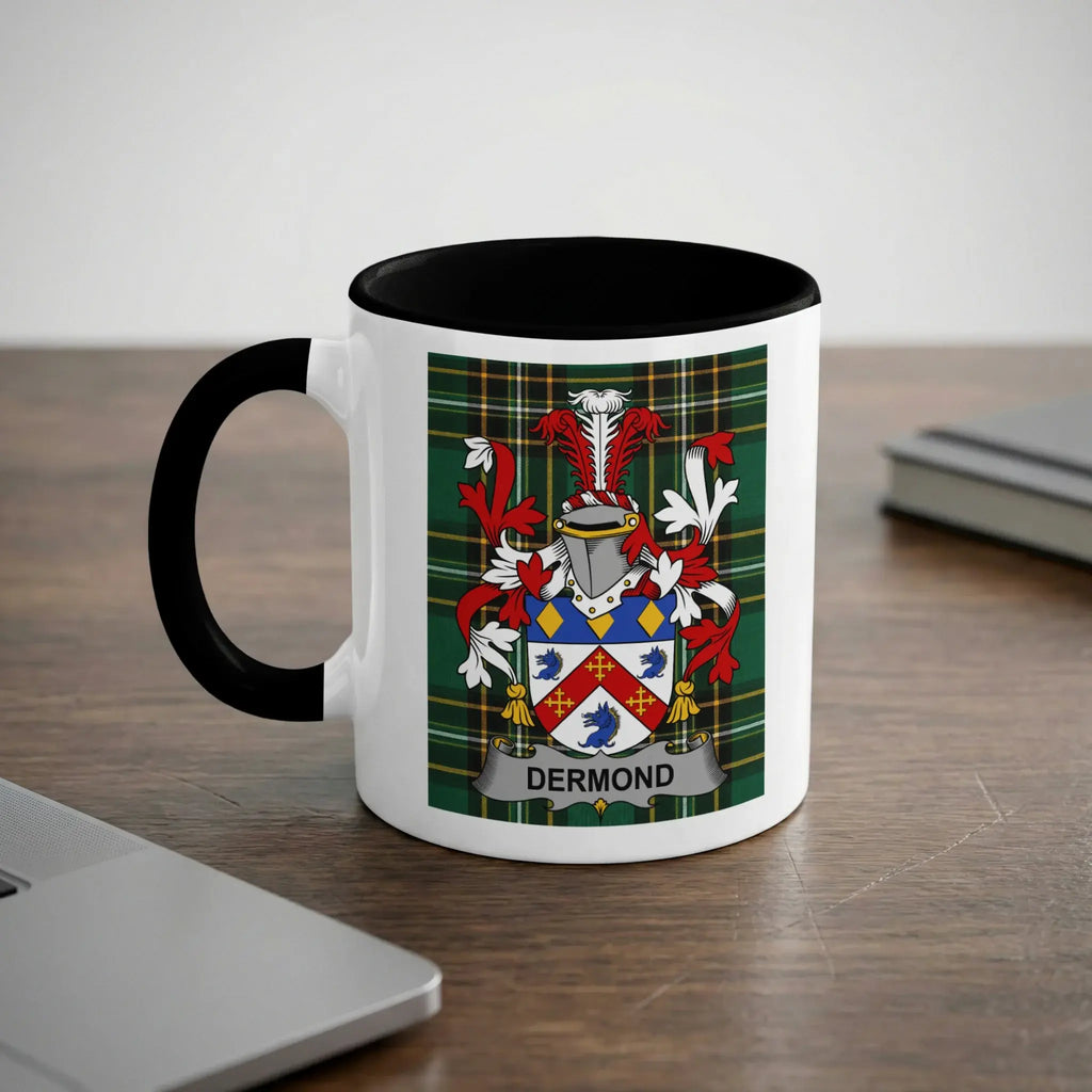 Mug with black handle and rim featuring the Dermond family crest on a tartan background.