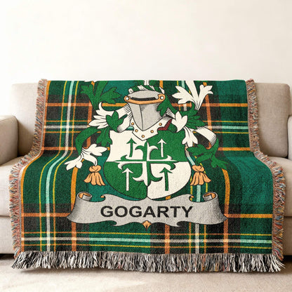 Green tartan throw blanket with the GOGARTY family crest centered.