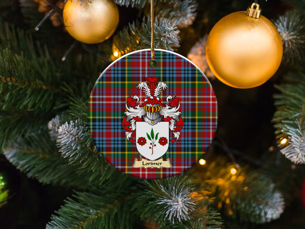 Lorimer family emblem ceramic Christmas ornament with Caledonia tartan background in festive holiday décor