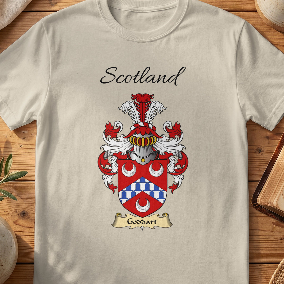 Sand Goddart Scottish family shield T-shirt featuring a blue-and-white chevron between white crescents