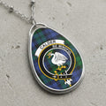 Calder clan Scottish tartan necklace with clan crest and Be Mindful motto on tartan background