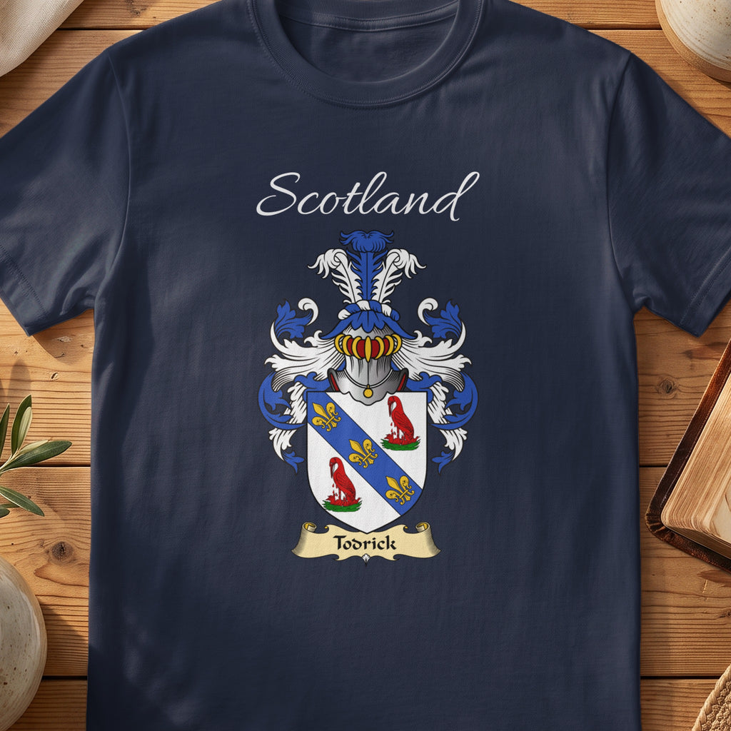 Navy Todrick heritage T-shirt laid flat with “Scotland” and the colourful family shield design.