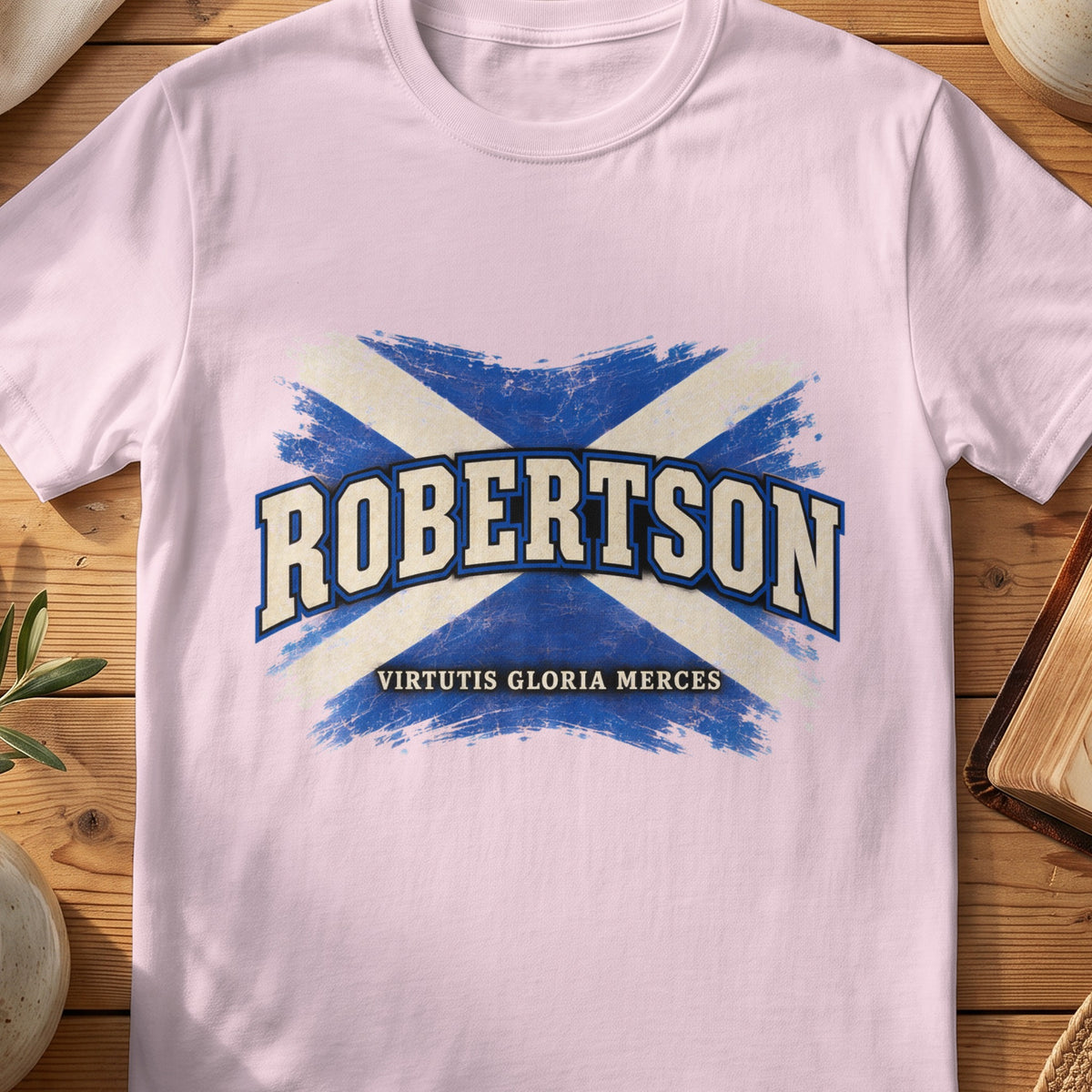 Robertson Scottish Saltire T-shirt in Light Pink, with distressed blue and cream flag and “Virtutis Gloria Merces” lettering.
