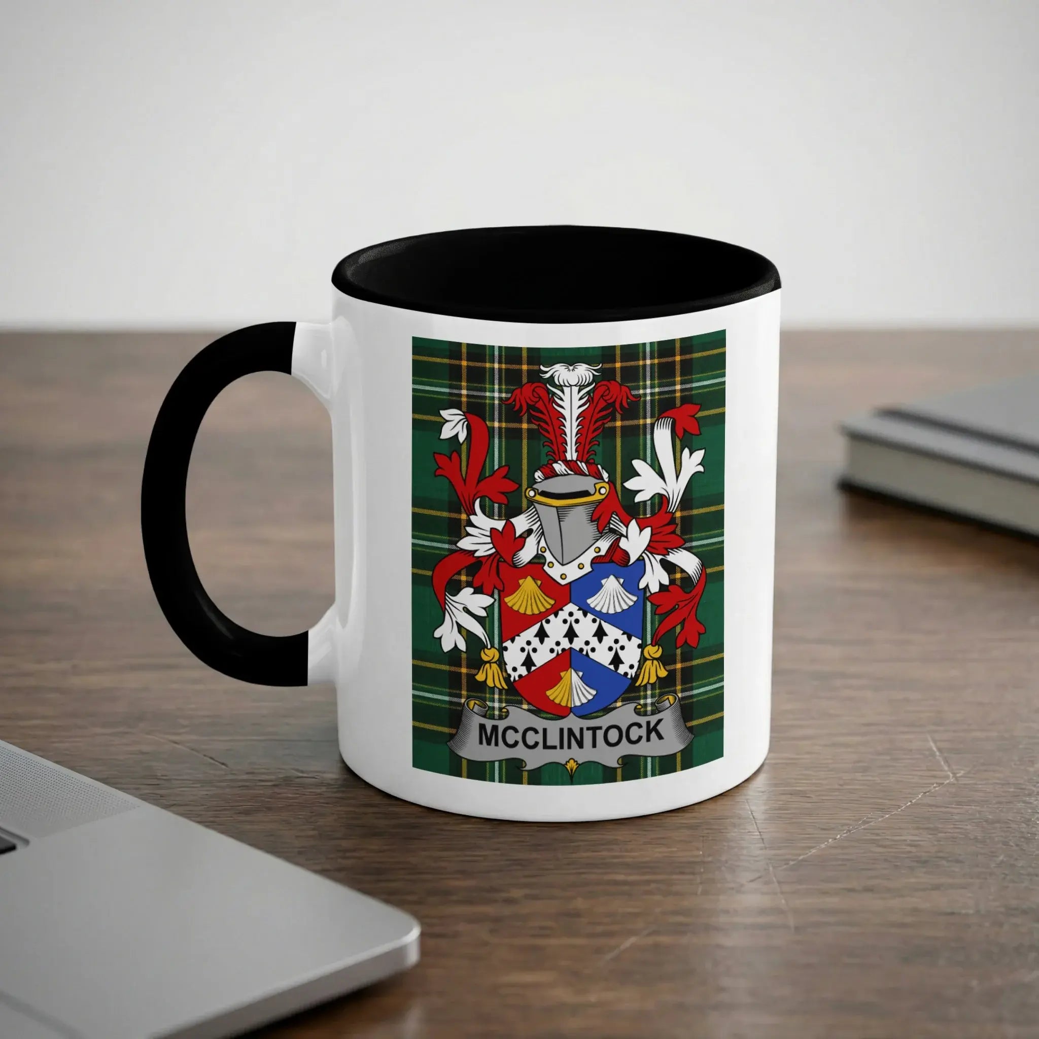 McClintock Irish heritage mug with black handle and family crest