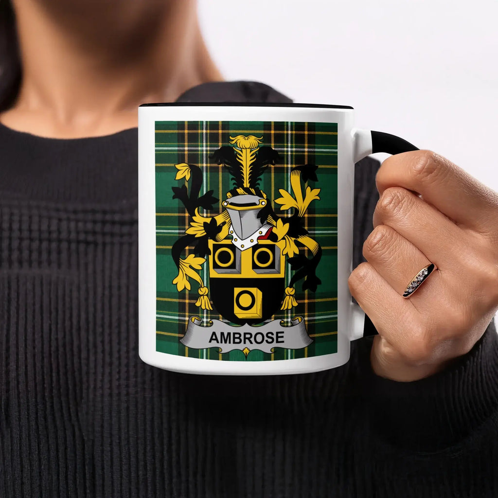 Ambrose family crest on a white mug with black trim.