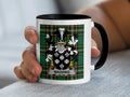 White mug with black rim featuring the Wadding family crest on tartan background.