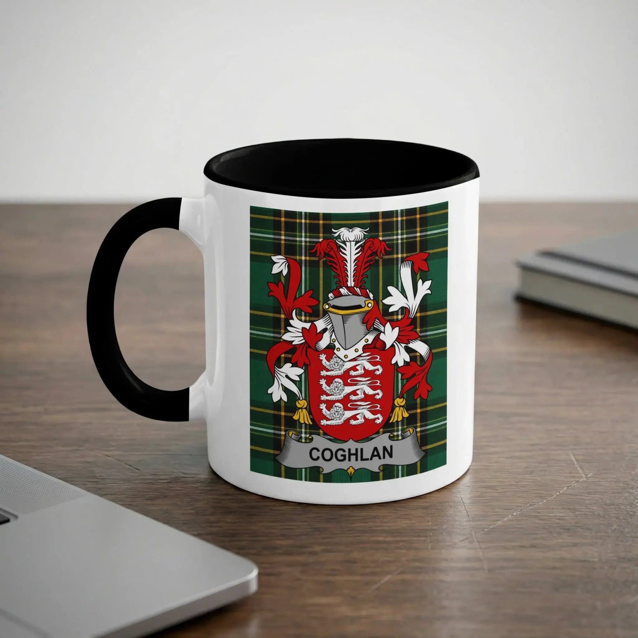 White mug with black handle featuring the Coghlan family crest.