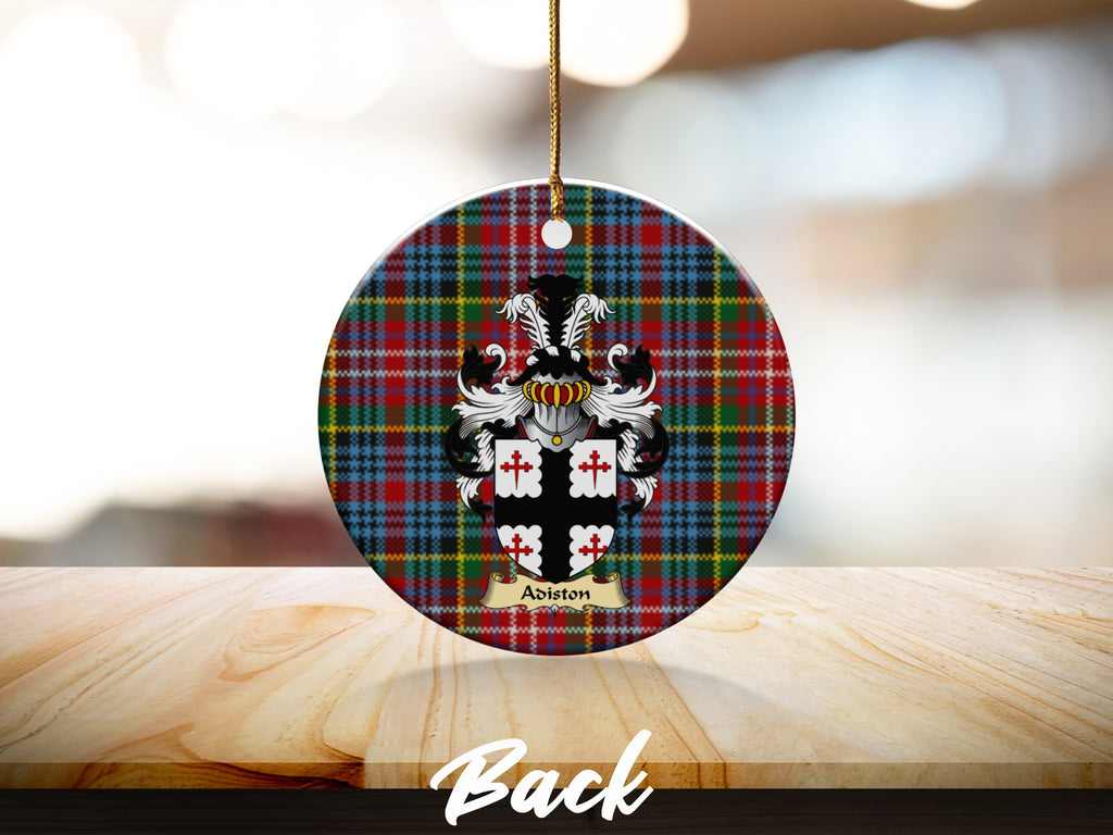 Round Adiston Scottish clan ornament with family crest on a Caledonia tartan background