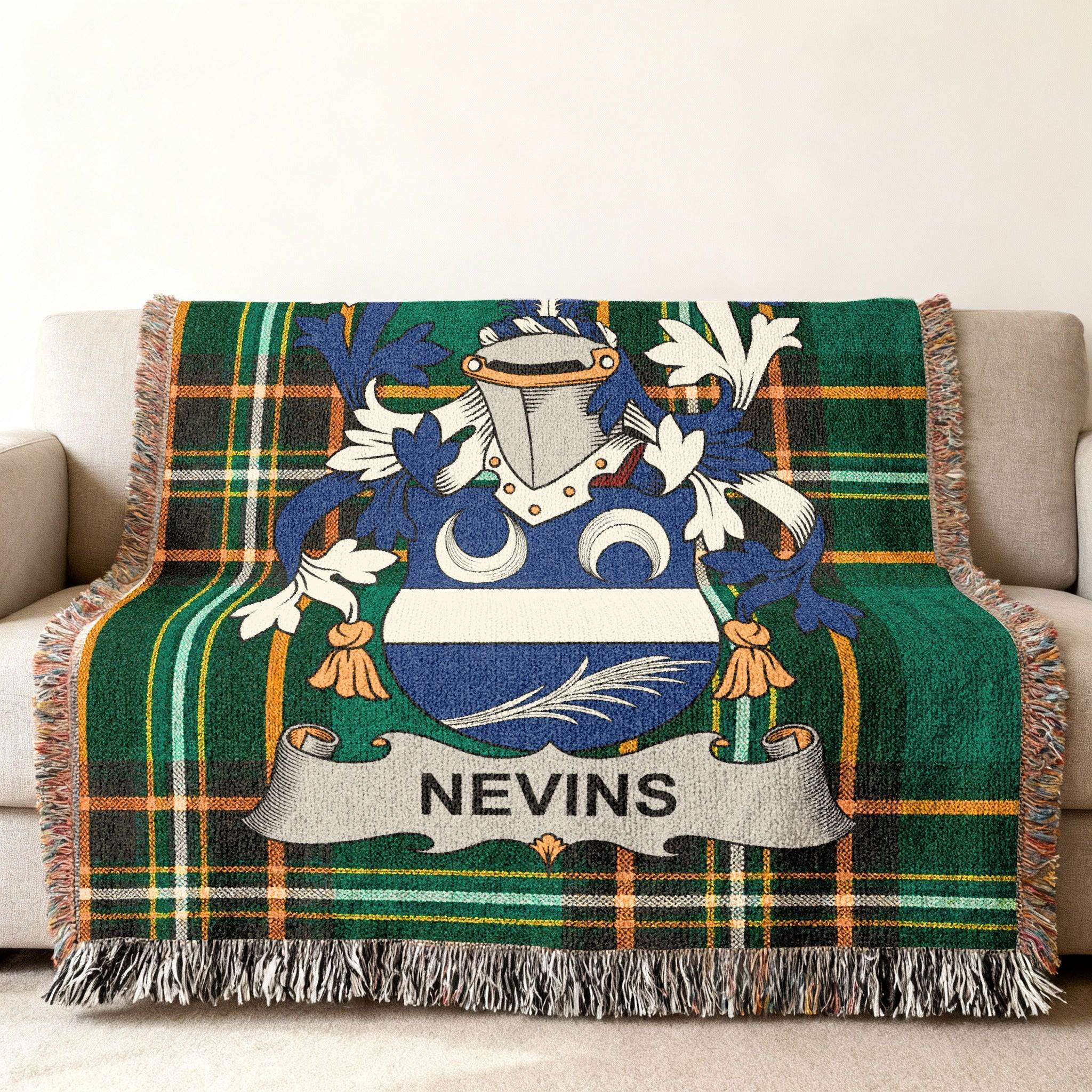 Green plaid throw blanket featuring the Nevins family crest.