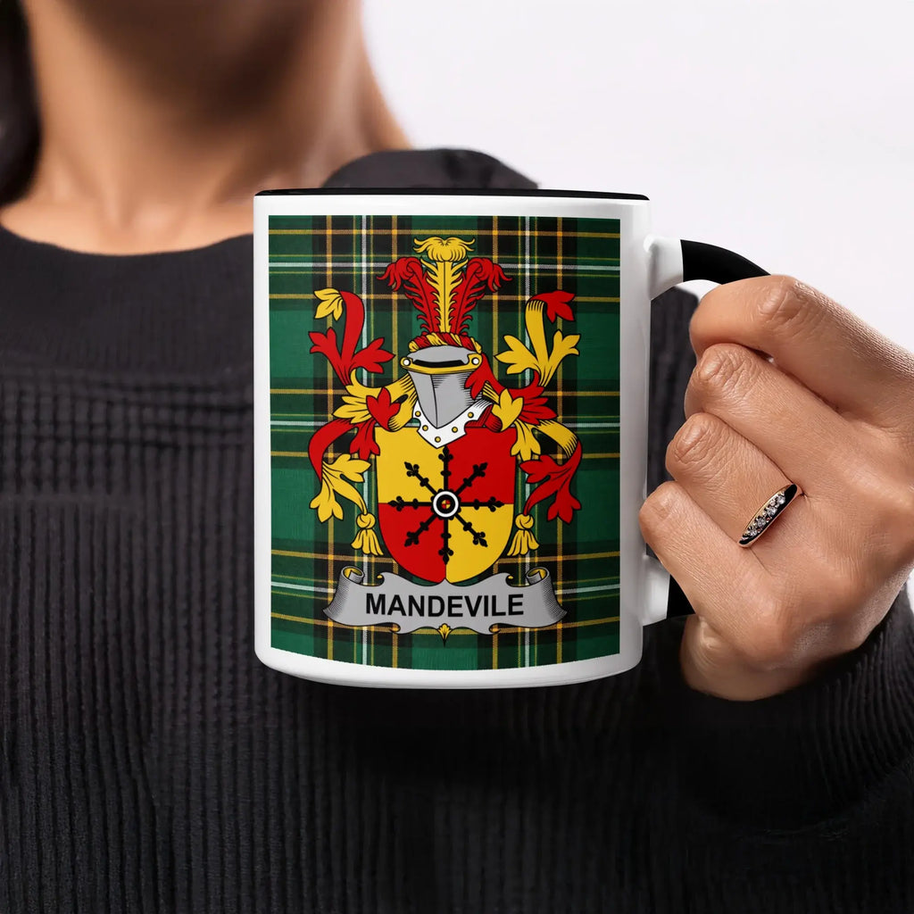 Mug with Mandeville family crest on green plaid background.