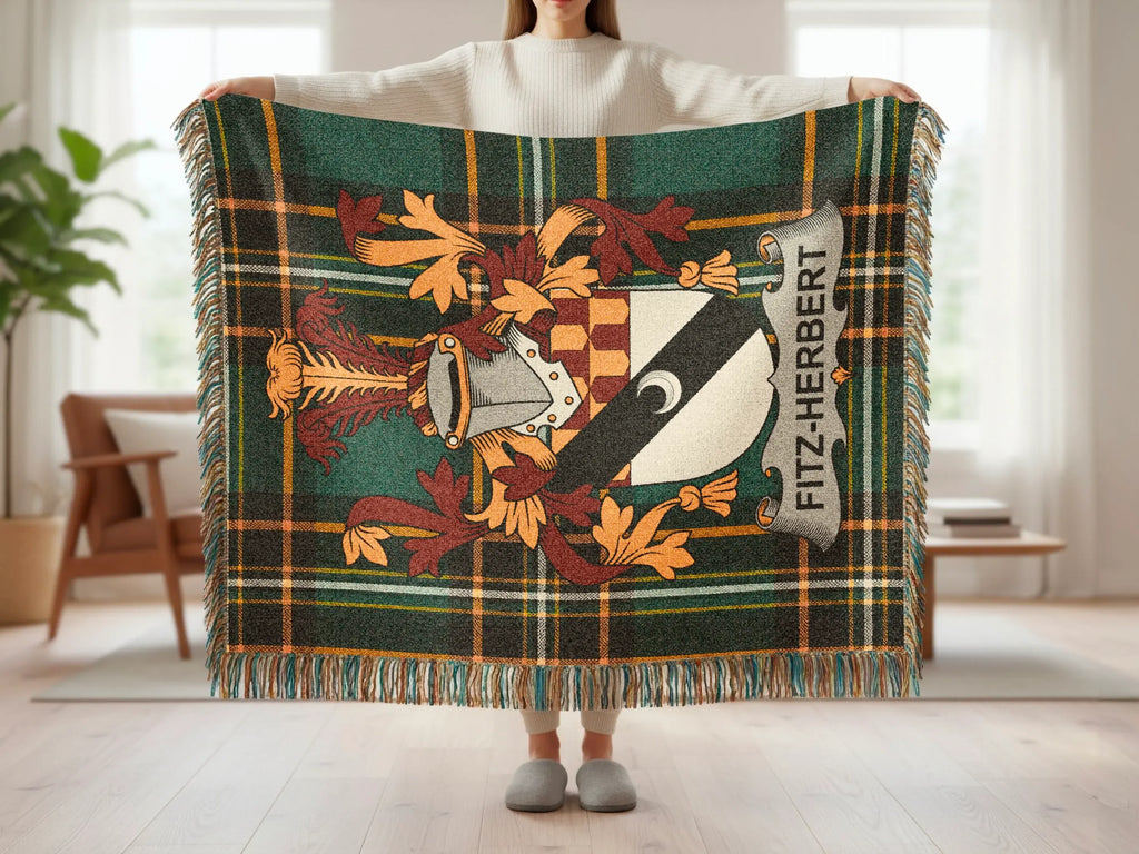 Fitz-Herbert tartan blanket featuring coat of arms and fringed edges.