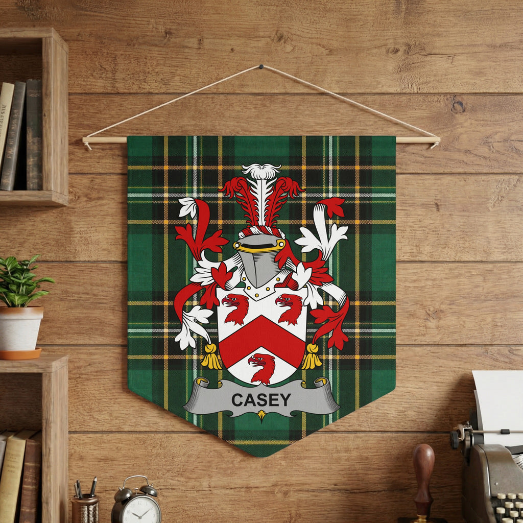 Casey family crest on a green plaid pennant banner hanging on a wooden wall.