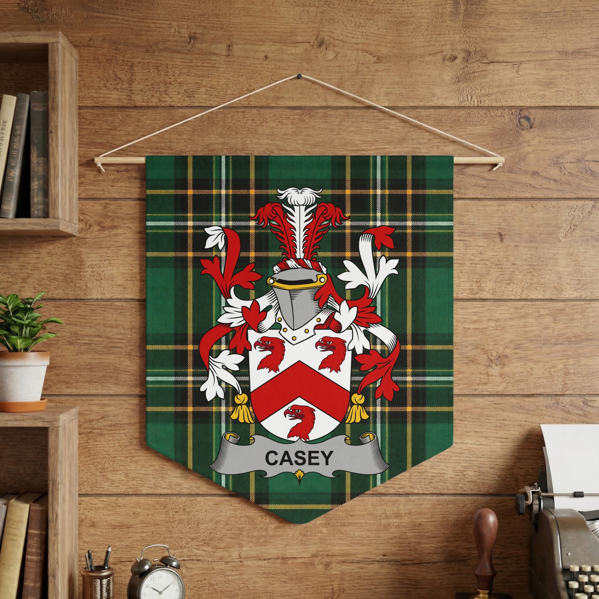 Casey family crest on a green plaid pennant banner hanging on a wooden wall.