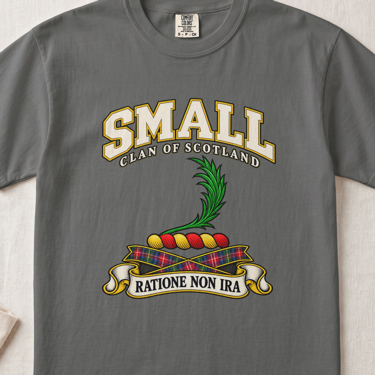 Small Scottish clan T-shirt in Pepper, front view with a green leafy frond and motto banner.