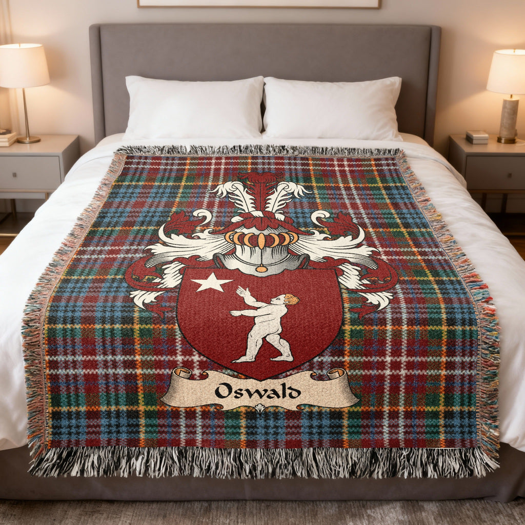 Oswald family crest emblem on a Caledonia tartan woven blanket