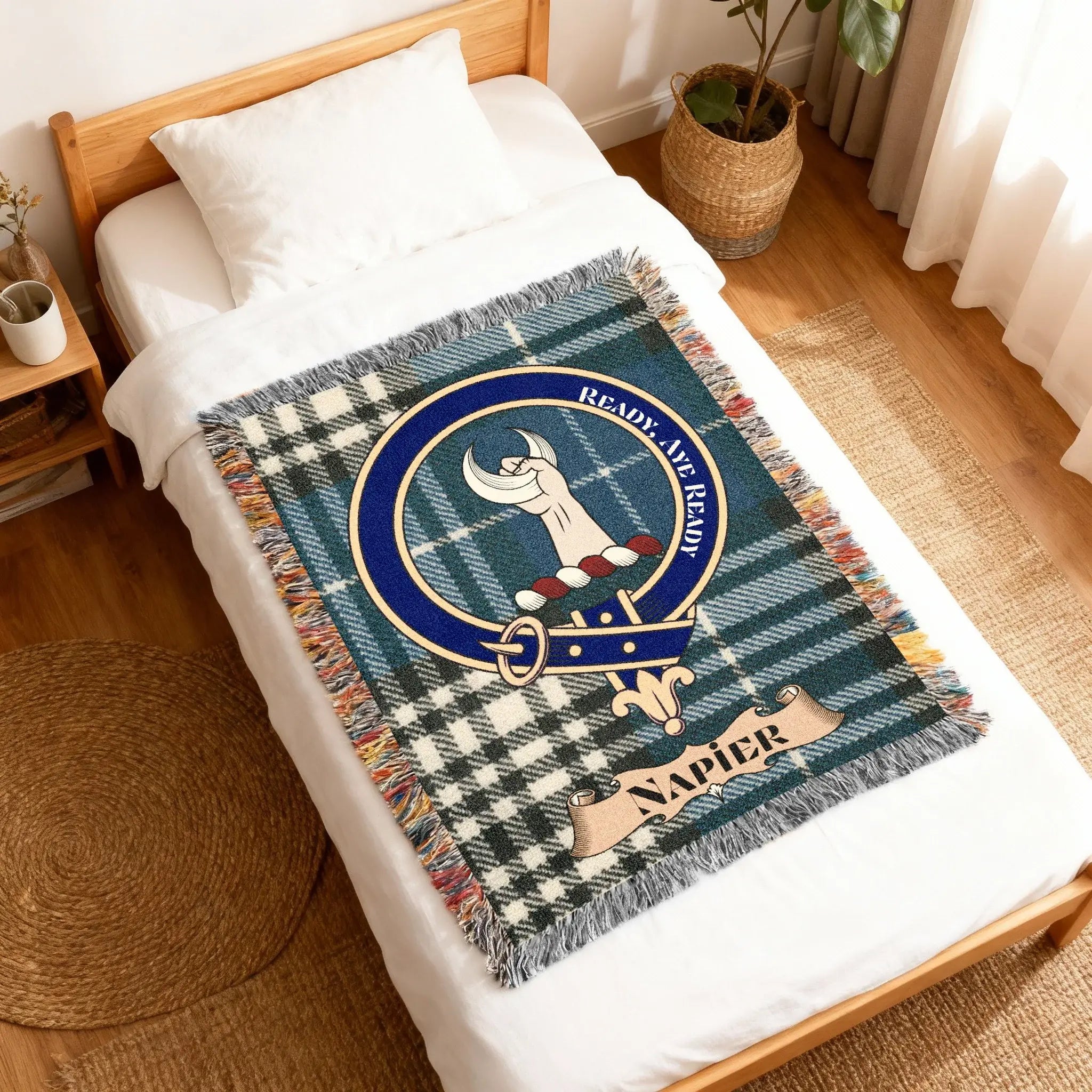 Close-up of Napier crest detail on woven cotton blanket