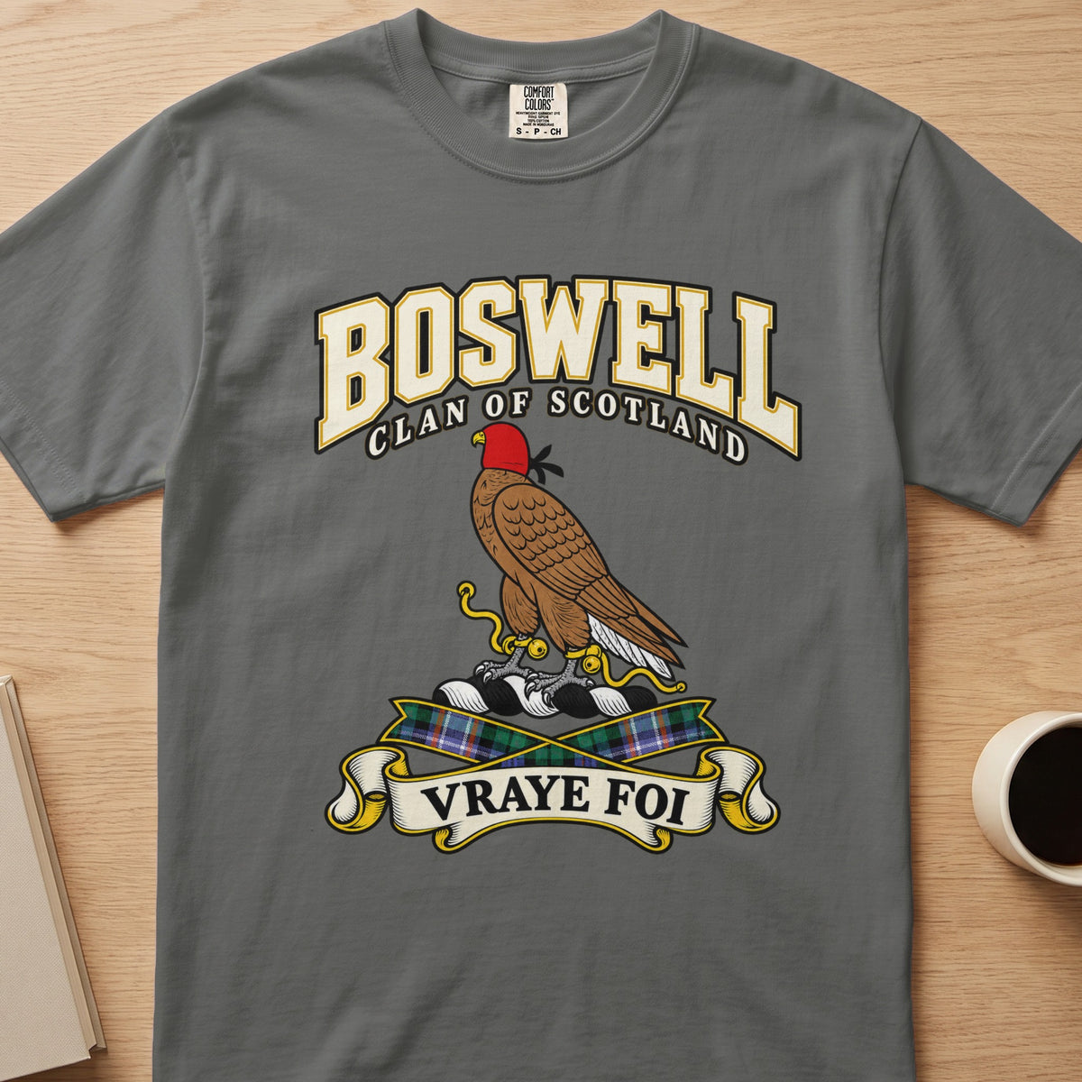 Boswell clan crest with hooded brown bird on a gray Comfort Colors T-shirt, front view