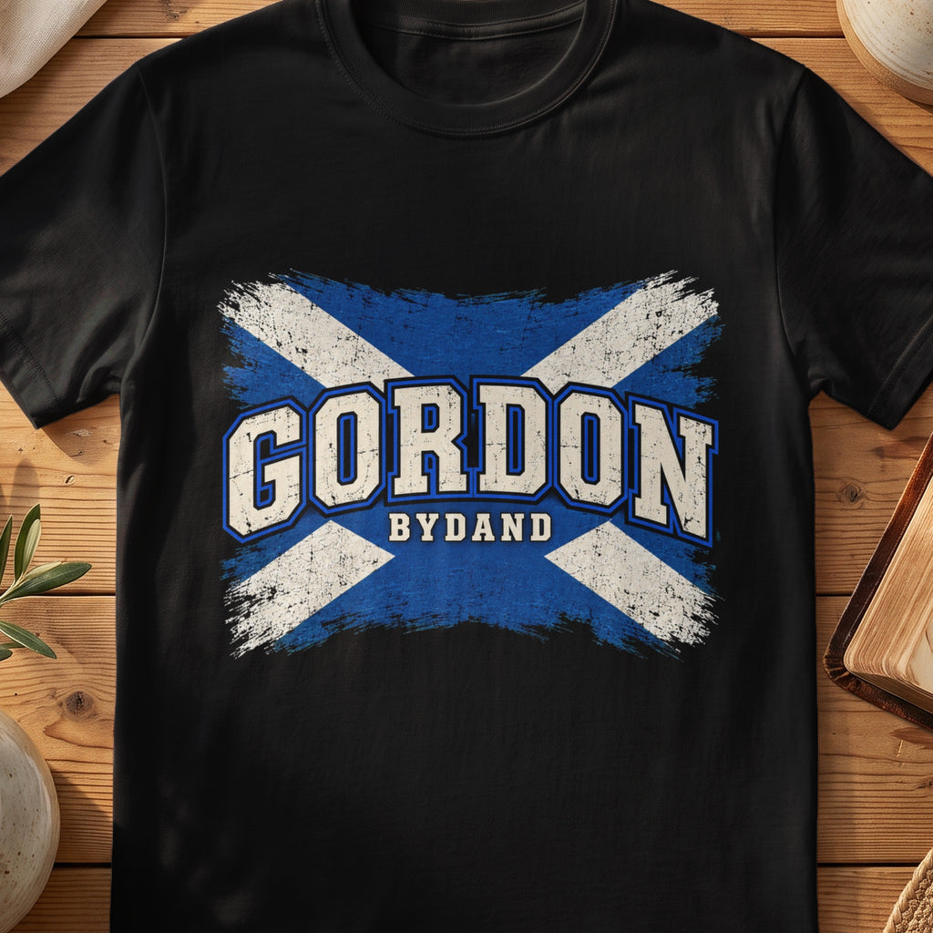 Gordon Scottish Saltire T-shirt in Black, with distressed blue and cream flag and “Bydand” lettering.