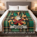 Plaid throw blanket with GIGGINS family crest.