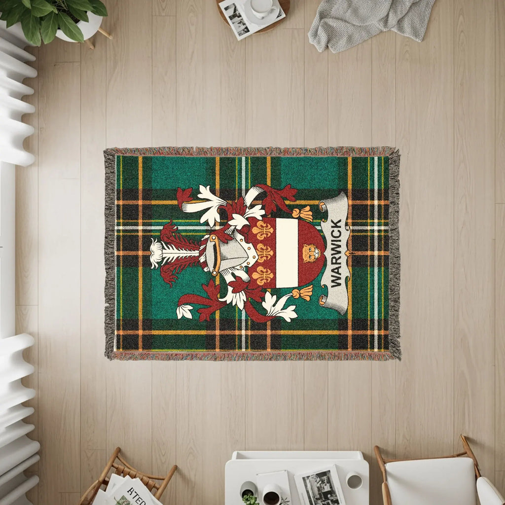 Woven plaid tapestry with Warwick coat of arms.