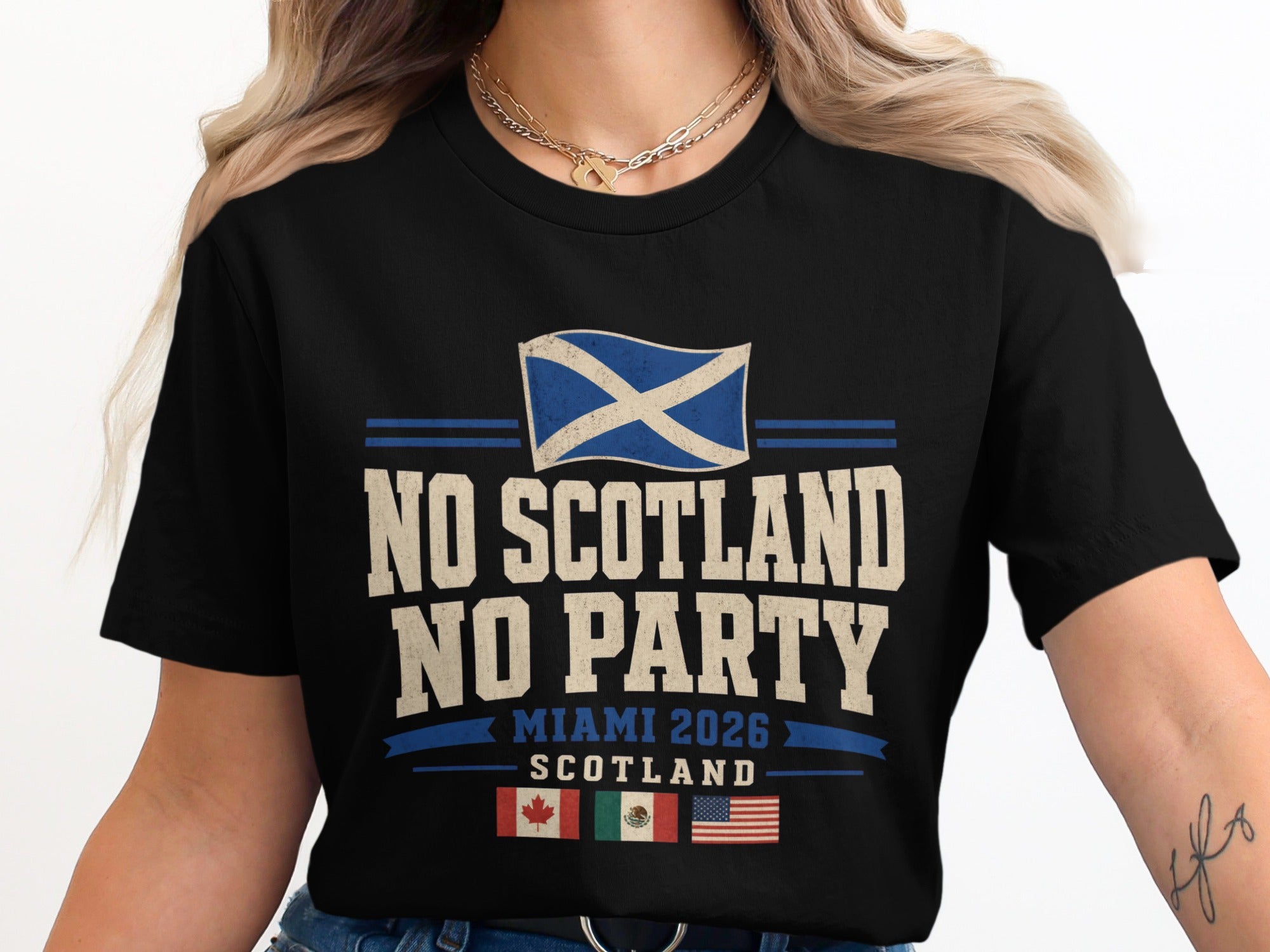 Black t-shirt with "NO SCOTLAND NO PARTY MIAMI 2026" and Scottish flag.