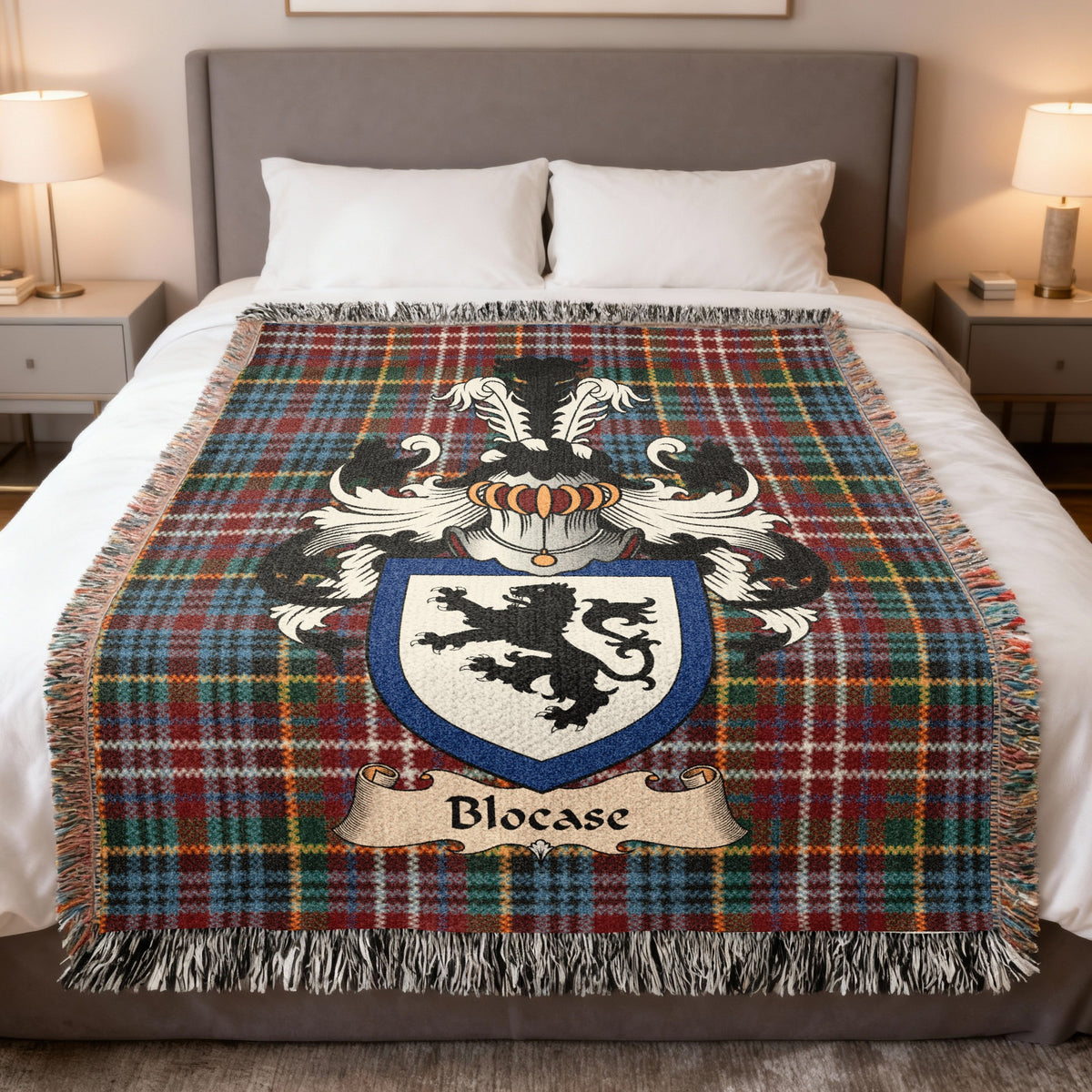 Blocase family crest emblem on a Caledonia tartan woven blanket