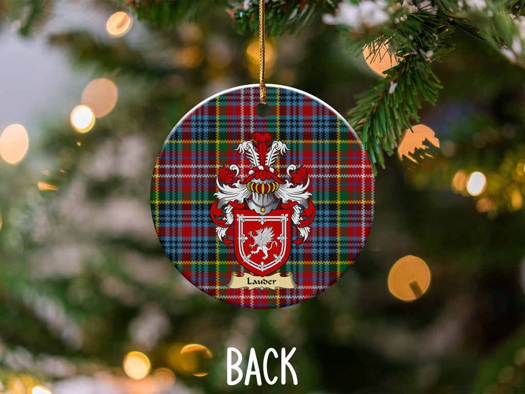 Lauder ceramic ornament detail showing a double-sided family shield on a Caledonia tartan background