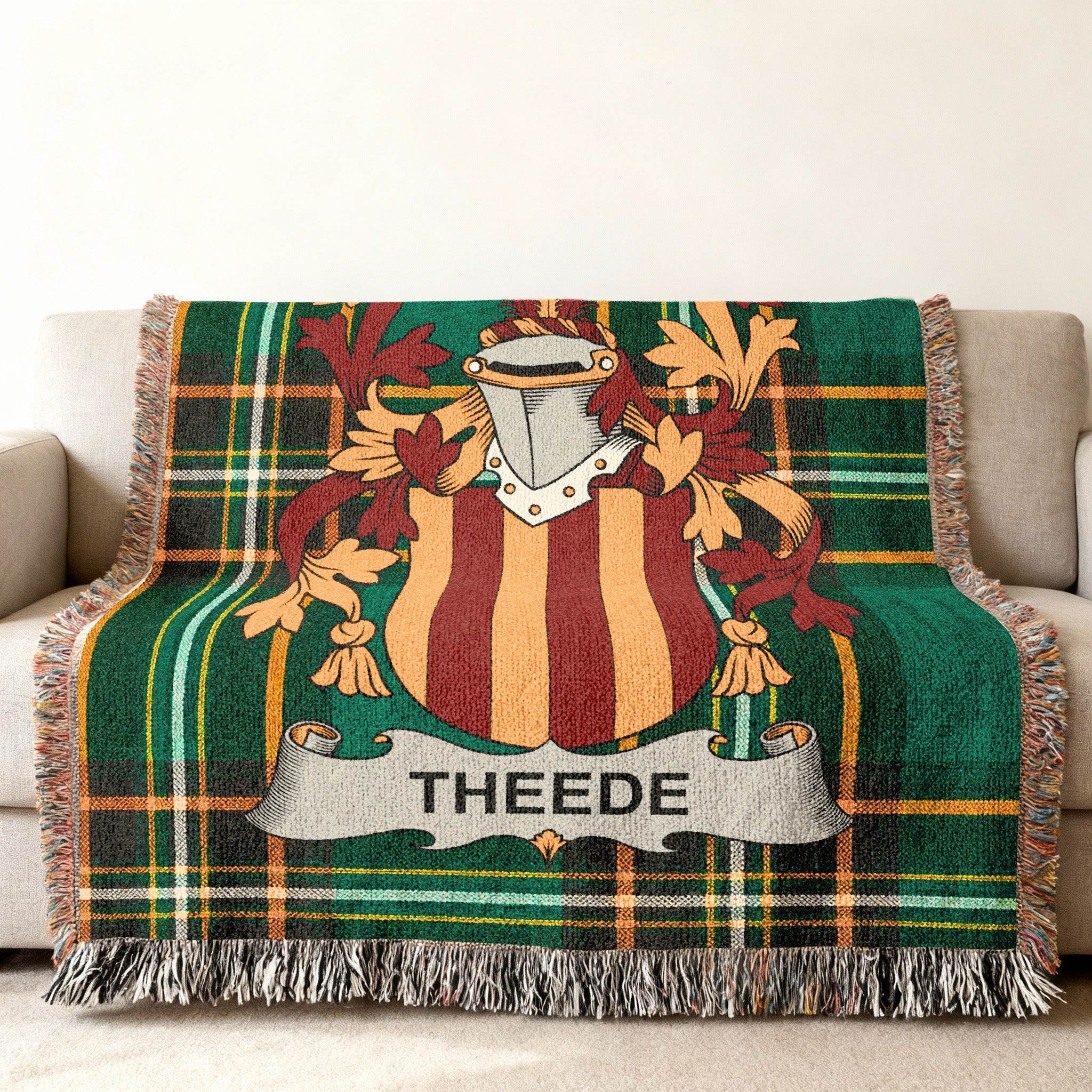 Plaid woven throw blanket with THHEDE family crest displayed prominently.