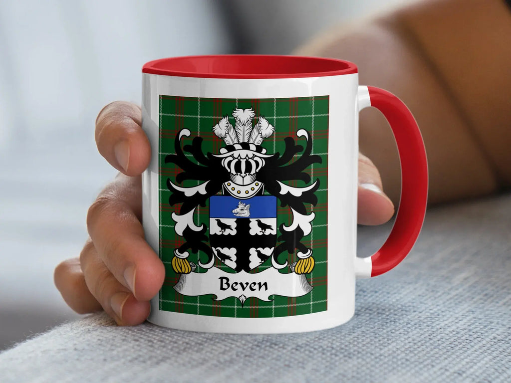 Beven Welsh tartan accent mug with red handle and coat of arms held in hand