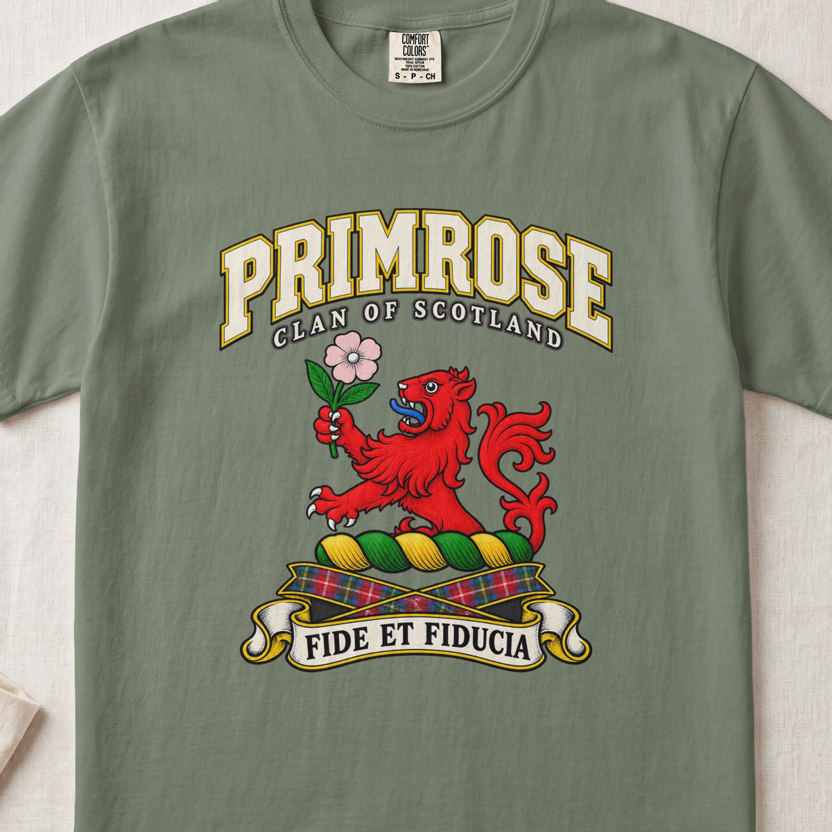 Primrose Scottish clan T-shirt in Moss, front view with a red lion holding a pink flower and motto design.